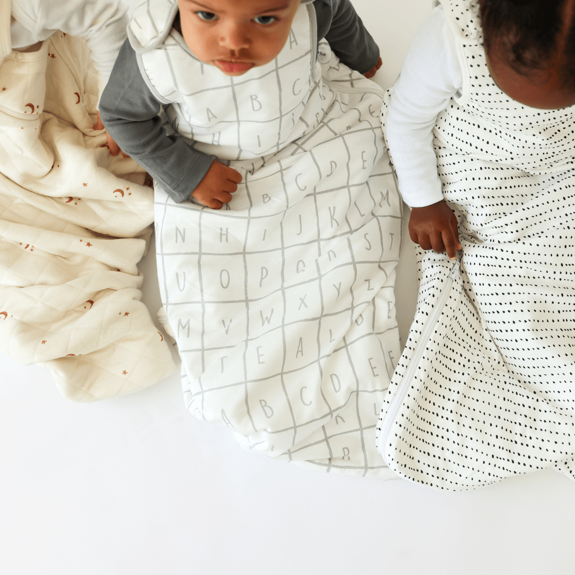 Children wearing Tealbee Dreambag in different togs