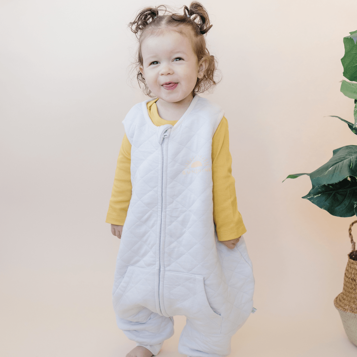 Toddler wearing Tealbee Sunshine Dreamsuit Sleep sack