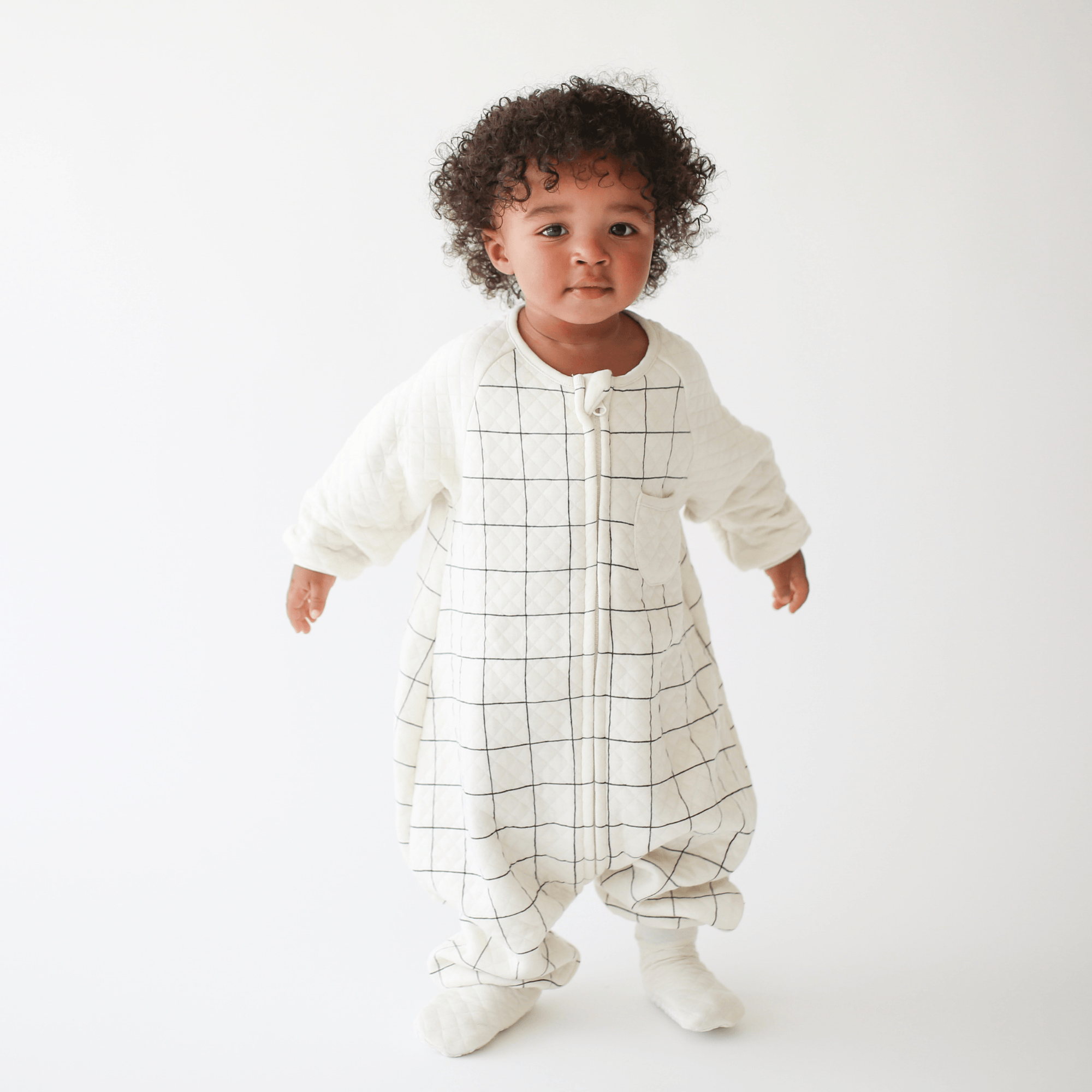 Baby wearing Sleep Sack Tealbee Dreamsie Checkered 0.8 TOG available from sizes 12m - 4T